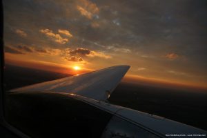 Sunset_photo_over_DC-3_airplane_wing